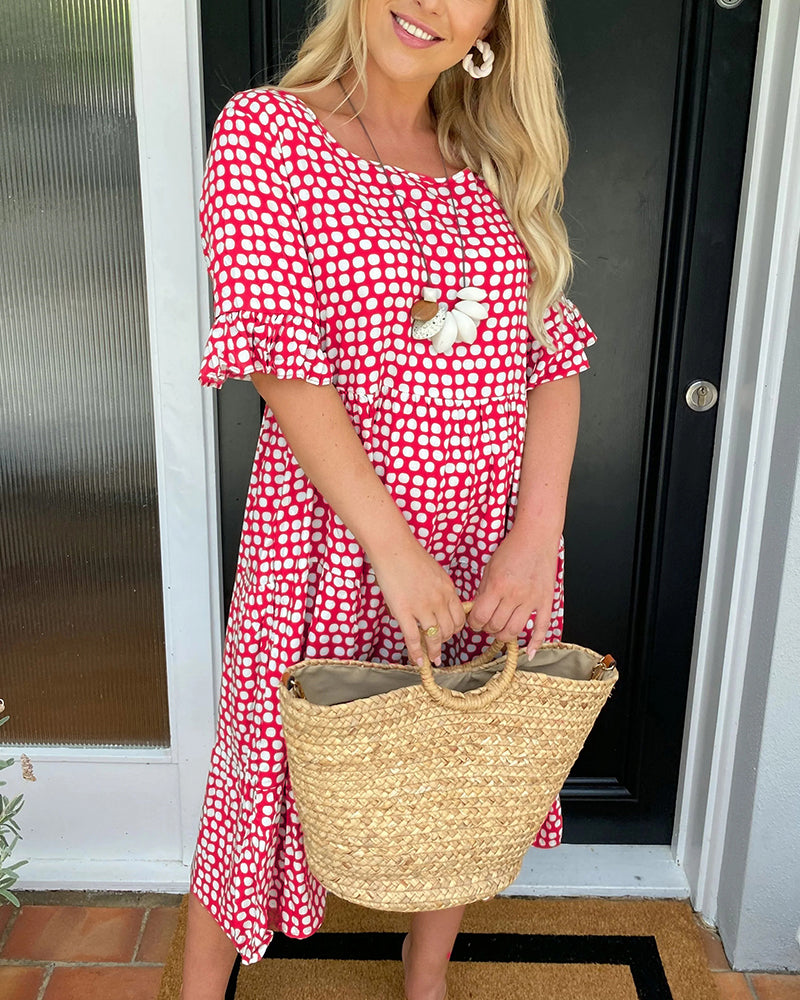 Vestido midi de cuello redondo con estampado de lunares