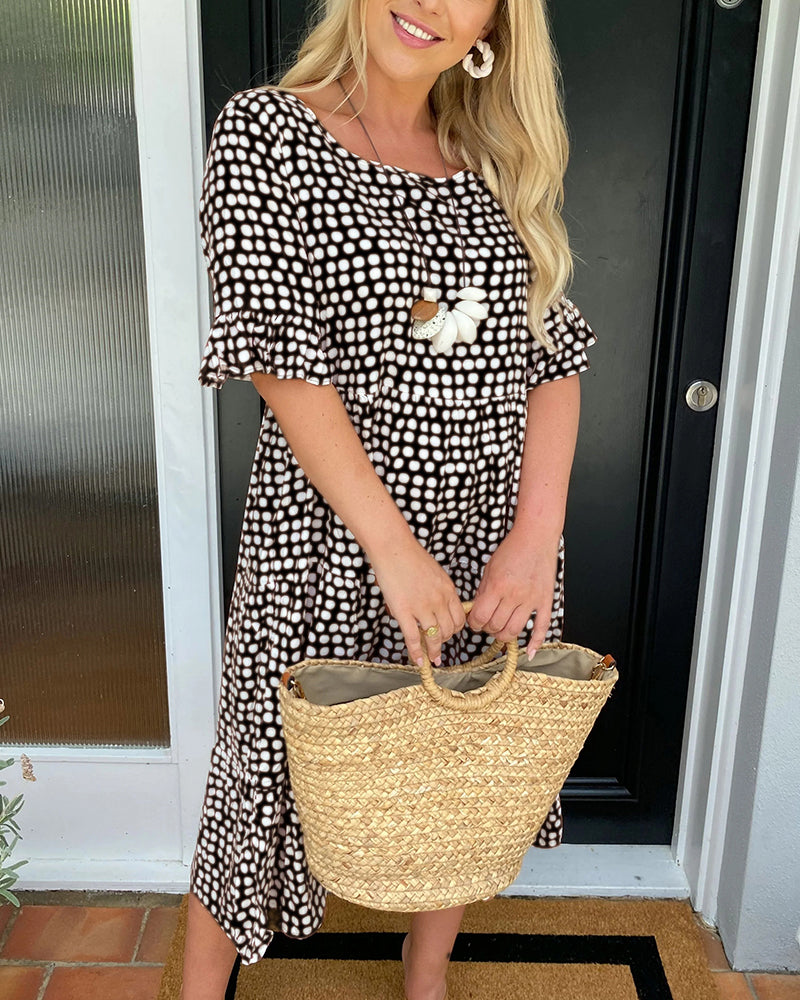 Vestido midi de cuello redondo con estampado de lunares