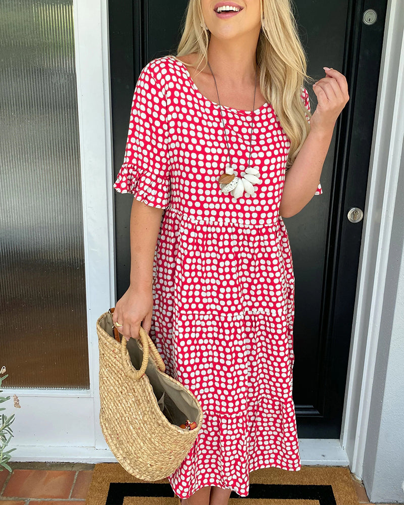 Vestido midi de cuello redondo con estampado de lunares