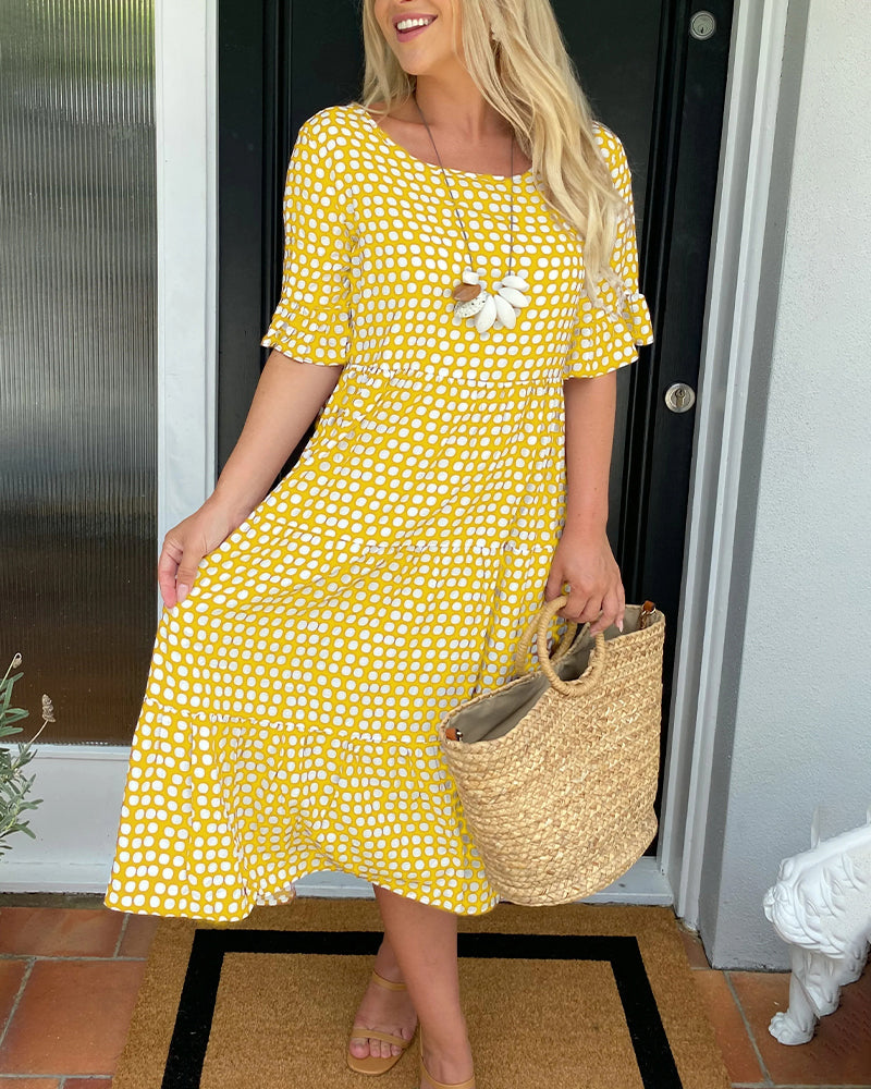 Vestido midi de cuello redondo con estampado de lunares