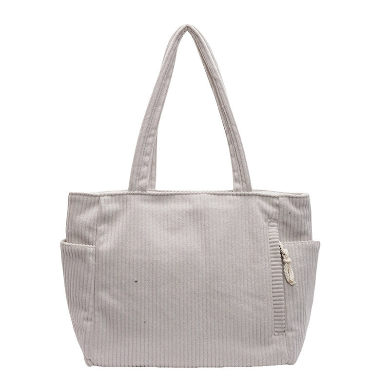 Tilda – Bolsa de hombro acanalada con detalle de cordón