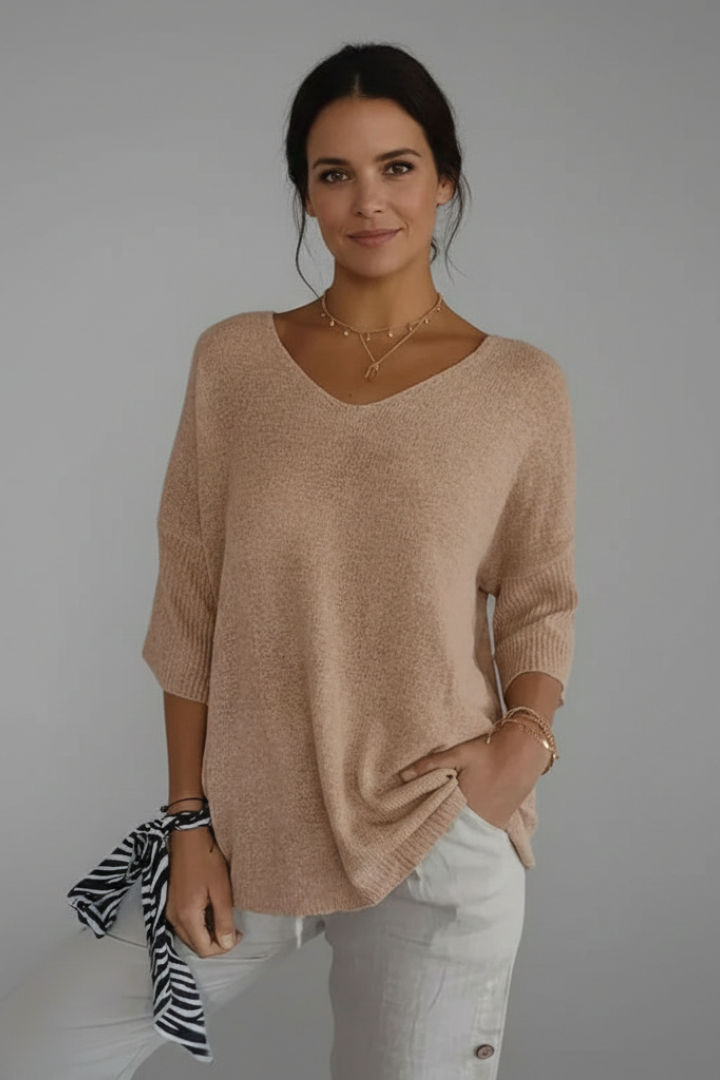 Women’s top with V neckline and elbow sleeves
