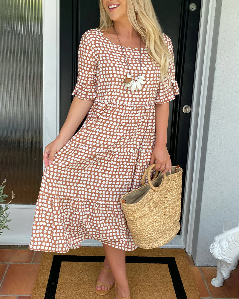 Vestido midi de cuello redondo con estampado de lunares